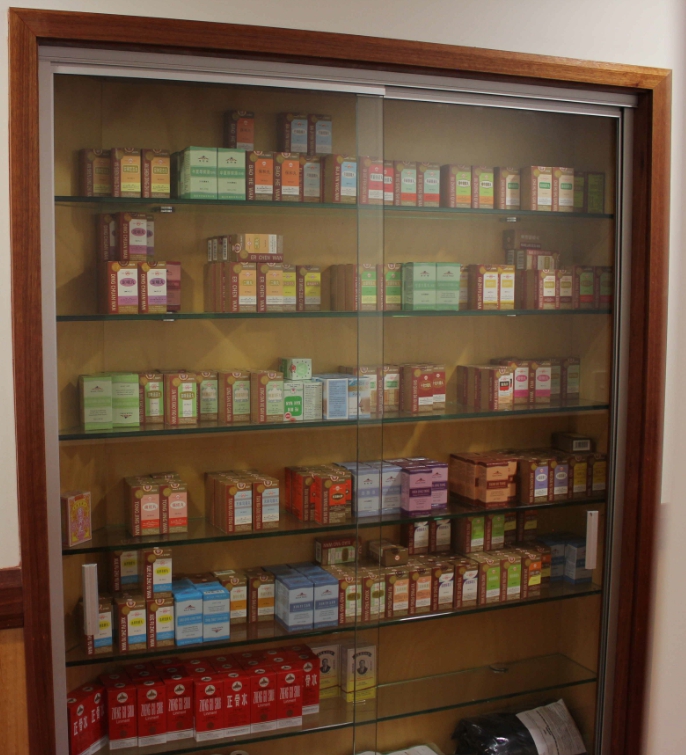 A cabinet full of traditional Chinese medicine